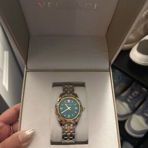 Versace Gold and Silver Timepiece with Blue Face